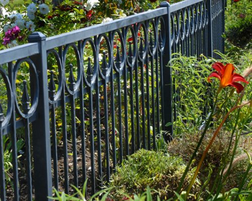 https://www.coastironworks.com/wp-content/uploads/2022/03/1-custom-fence-handmade-fence-wrought-iron-fence-privacy-fence-decorative-fence-500x400.jpg