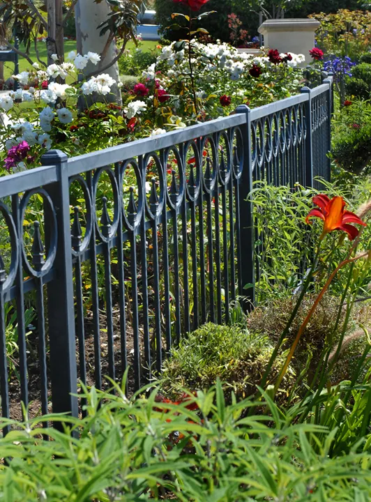 //www.coastironworks.com/wp-content/uploads/2022/05/1-custom-fence-handmade-fence-wrought-iron-fence-privacy-fence-decorative-fence-1.webp